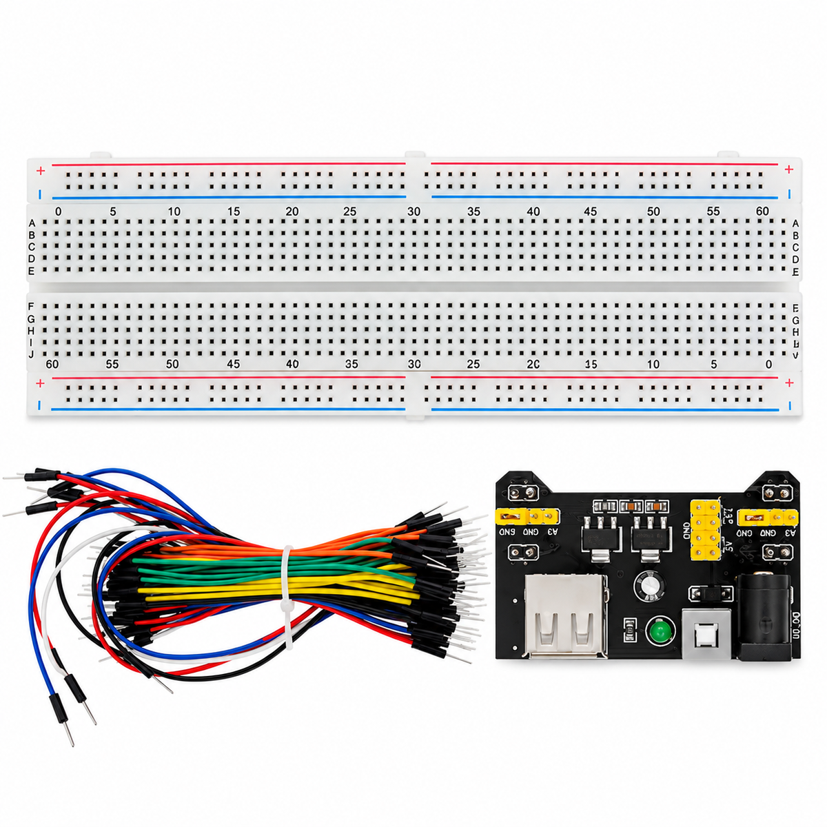 Contenido del kit protoboard MB102: placa de pruebas, cables puente macho–macho y módulo de alimentación